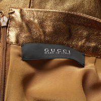 Gucci Rok Lakleer in Goud