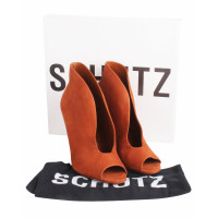Schutz Boots Leather in Brown