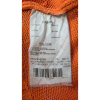 Burberry Jacke/Mantel aus Baumwolle in Orange