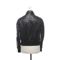 Golden Goose Jacke/Mantel aus Leder in Schwarz