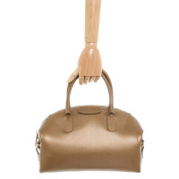 Coccinelle Handtasche aus Leder in Gold