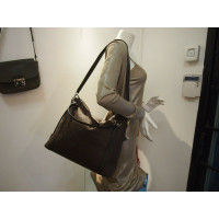Louis Vuitton Ixia Bag aus Leder in Braun