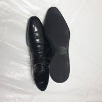 Prada Schnürschuhe aus Leder in Schwarz