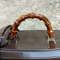 Gucci Travel bag Patent leather in Brown