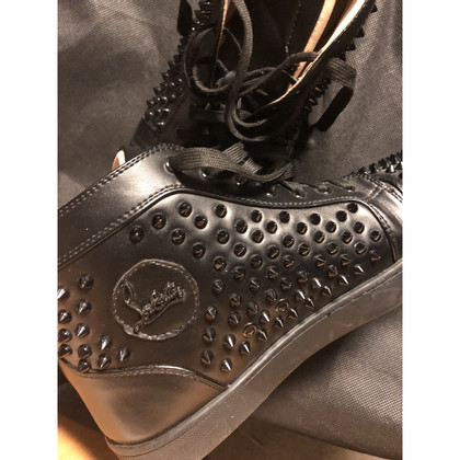 Christian Louboutin Sneakers aus Leder in Schwarz