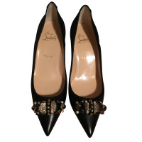 Christian Louboutin pumps with decorative trimmings