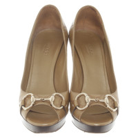 Gucci Gold colored leather peep toes
