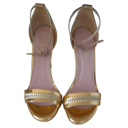 Roberto Botticelli Pumps/Peeptoes Patent leather in Gold