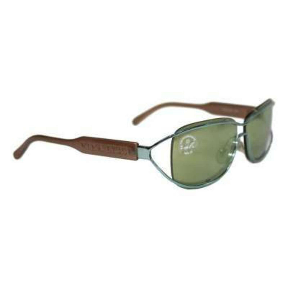 Nina Ricci Sunglasses in Green