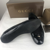 Gucci Slippers/Ballerina's Lakleer in Zwart