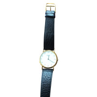 Hermès Horloge Leer in Goud