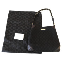 Gucci Leather bag and monogram fabric