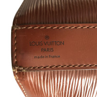 Louis Vuitton Pochette aus Leder in Braun