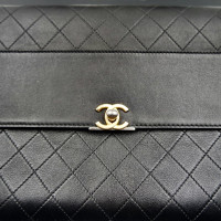 Chanel Clutch aus Leder in Schwarz