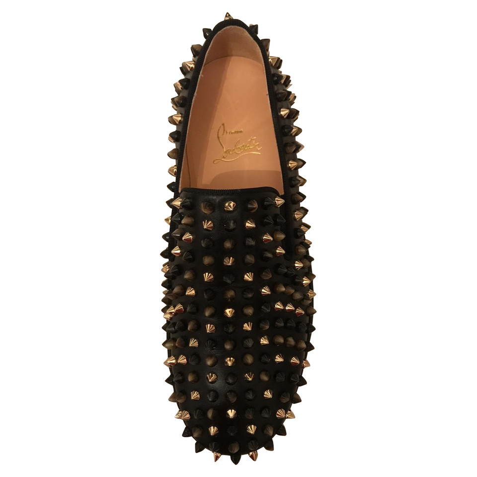 Christian Louboutin Slip ons with studs