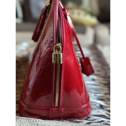 Louis Vuitton Alma Patent leather in Red