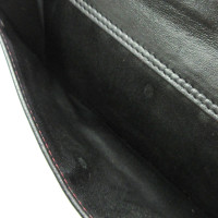 Chanel Täschchen/Portemonnaie aus Leder in Schwarz