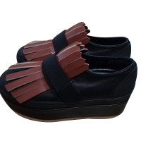 Marni Chaussures compensées en Cuir en Noir