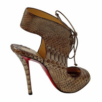 Christian Louboutin Sandals in Gold