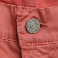 7 For All Mankind trousers in bright coral red