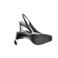 Christian Dior Pumps/Peeptoes aus Lackleder in Schwarz