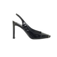 Christian Dior Pumps/Peeptoes aus Lackleder in Schwarz