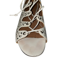 Alaïa Sandalen aus Leder in Weiß