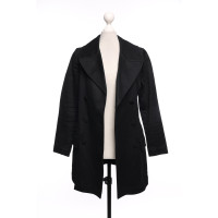 Alaïa Jacke/Mantel aus Baumwolle in Schwarz