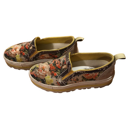 Msgm Slip ons with a floral pattern