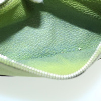 Hermès Clutch aus Leder in Grün