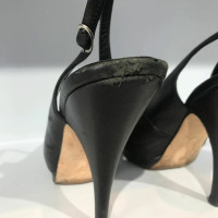 Giuseppe Zanotti Pumps/Peeptoes aus Leder in Schwarz