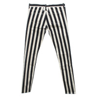 Saint Laurent trousers in black / cream