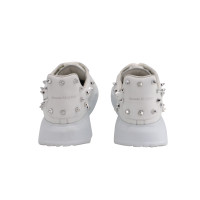 Alexander McQueen Sneakers aus Leder in Weiß