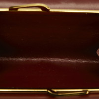 Cartier Täschchen/Portemonnaie aus Leder in Rot