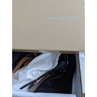 Sergio Rossi Sandalen aus Lackleder in Schwarz