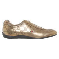 Gucci Goldfarbene Sneakers