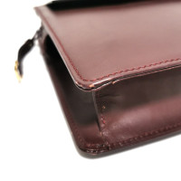 Cartier Clutch en Cuir en Bordeaux