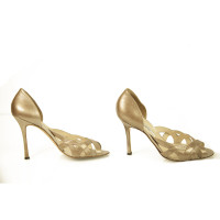 Brian Atwood Sandalen aus Leder in Gold