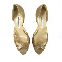 Brian Atwood Sandalen aus Leder in Gold