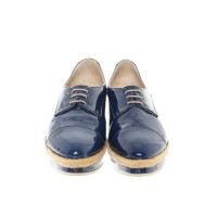 Agl Chaussures à lacets en Cuir verni en Bleu