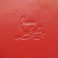 Christian Louboutin Täschchen/Portemonnaie aus Leder in Rot