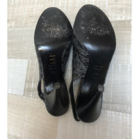 Pollini Pumps/Peeptoes Patent leather in Black