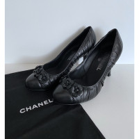 Chanel Pumps/Peeptoes en Cuir en Noir