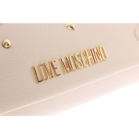 Moschino Love Handtasche in Creme