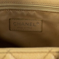 Chanel Grand  Shopping Tote en Cuir en Beige