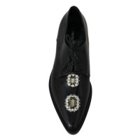 Dolce & Gabbana Slipper/Ballerinas aus Leder in Schwarz