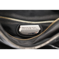 Paule Ka Handtasche aus Leder in Schwarz