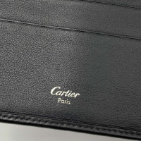 Cartier Täschchen/Portemonnaie aus Leder in Schwarz