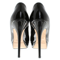 Jimmy Choo pumps made of lacquered leather