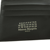Maison Martin Margiela Täschchen/Portemonnaie aus Leder in Gold